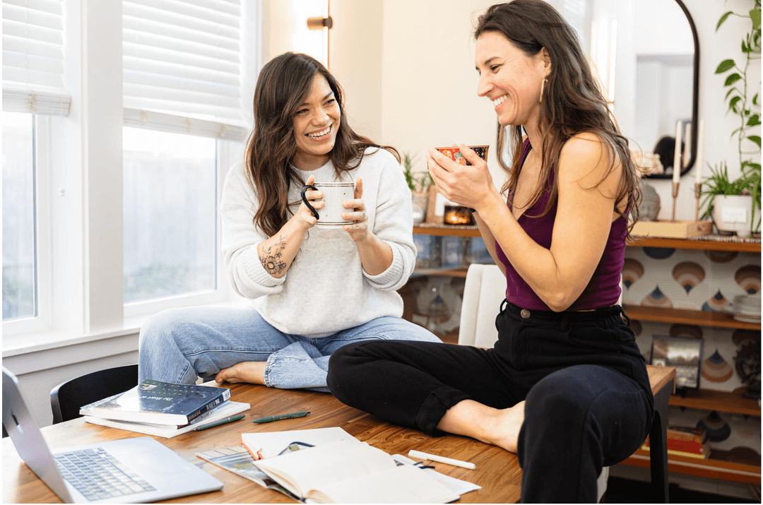 Founders at work, laughing